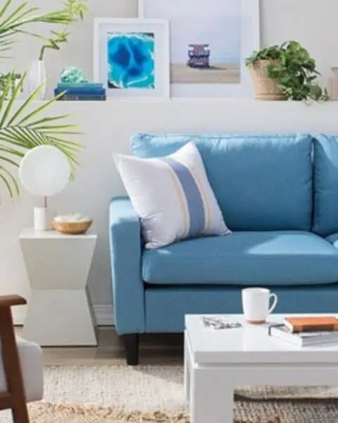 Blue couch in a clean living room.