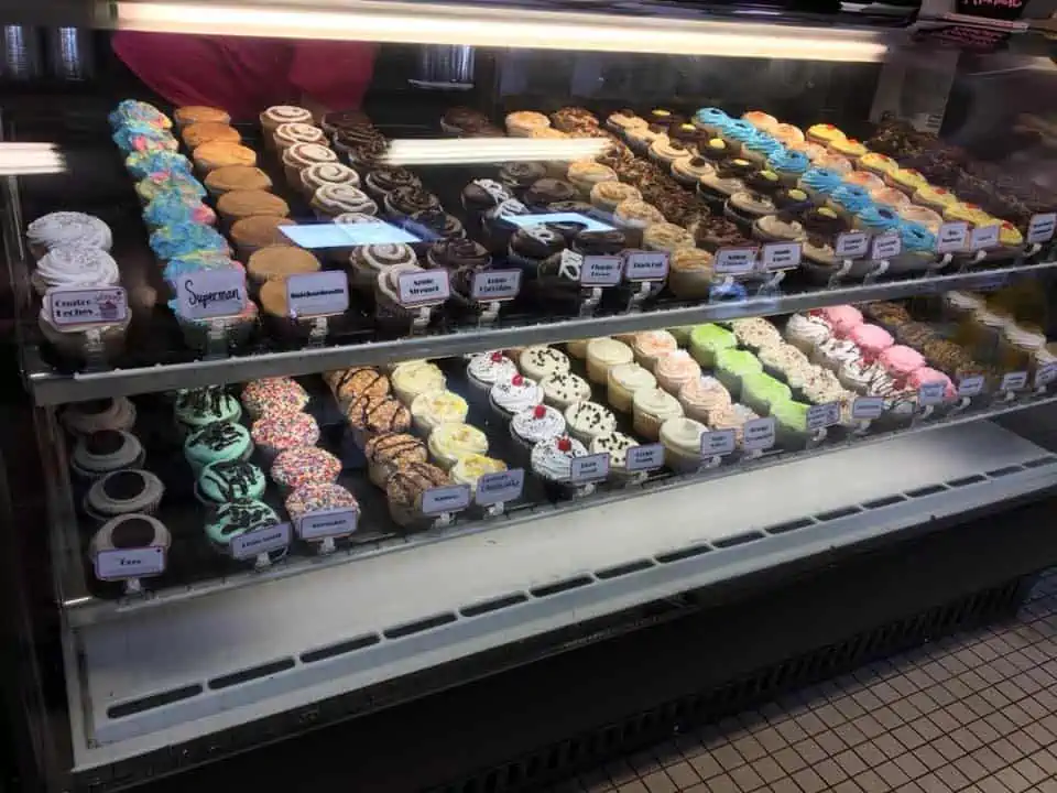 A display in a store filled with lots of different types of food, with Bavarian Inn Lodge and Bakery