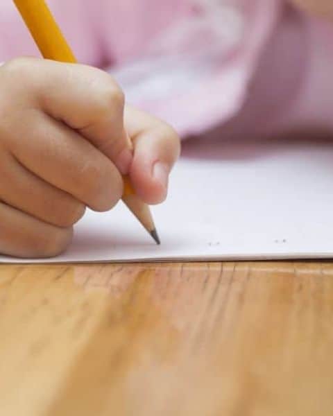 little girl doing her homework