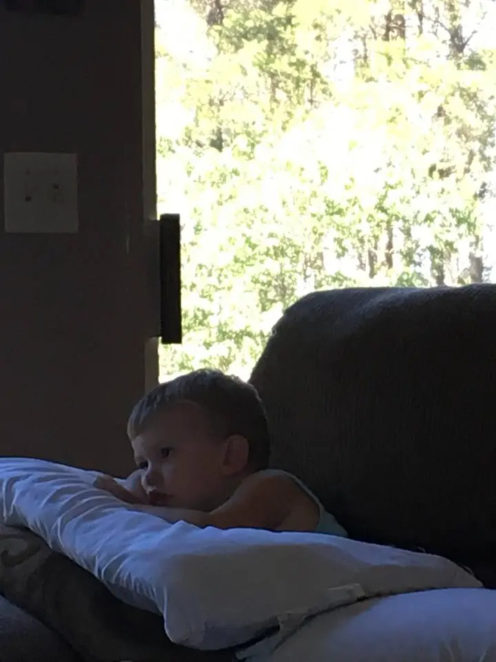 A boy lying on a bed