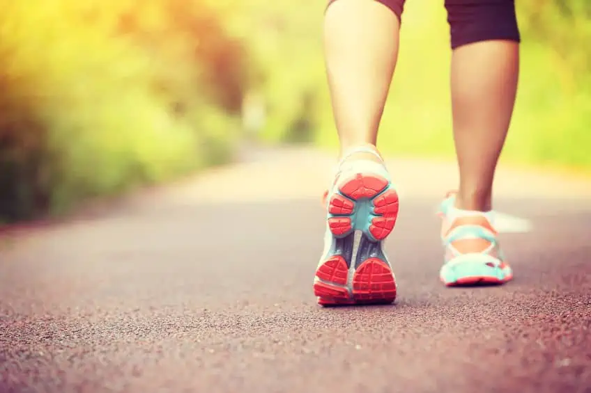 Woman in running shoes, ready to get exercise.