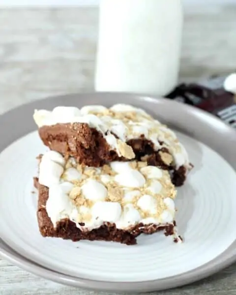 Homemade s'mores cake with cooked marshmallows.
