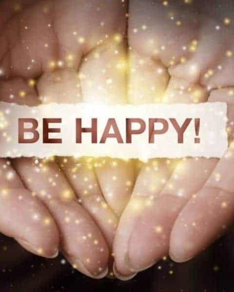 the words Be Happy help in the hands of a woman with sparkly glitter