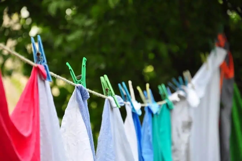 how to lower electric bill by doing your laundry outside.