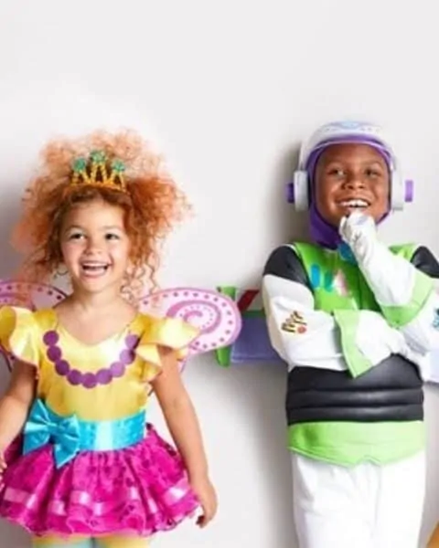 two kids wearing Disney costumes