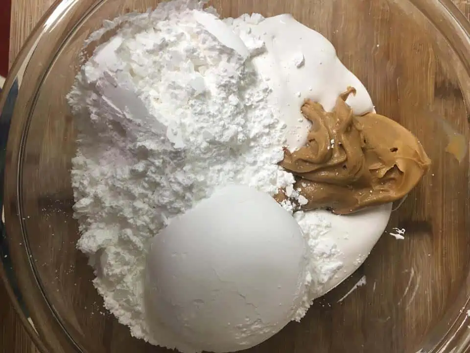 Powdered sugar. sugar, and flour in Homemade Snickers Candy Bar Recipe