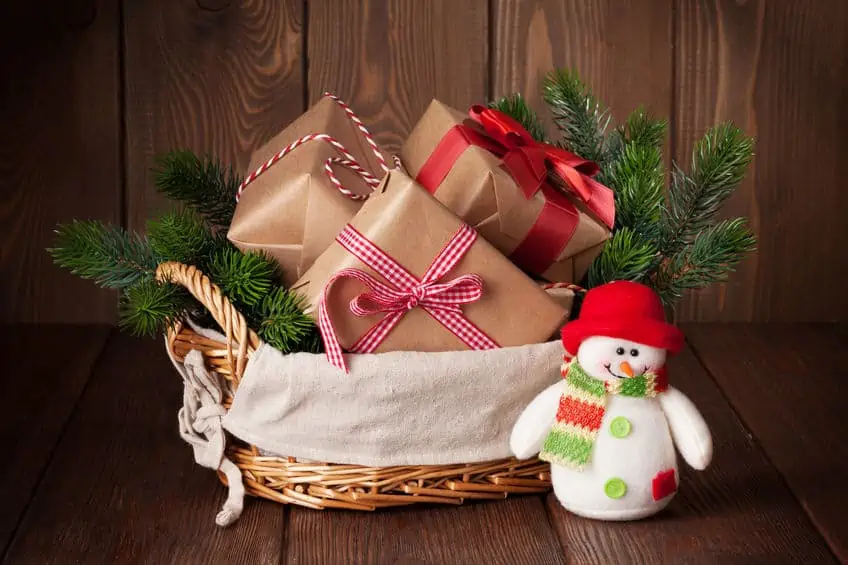 A basket full of Christmas presents.