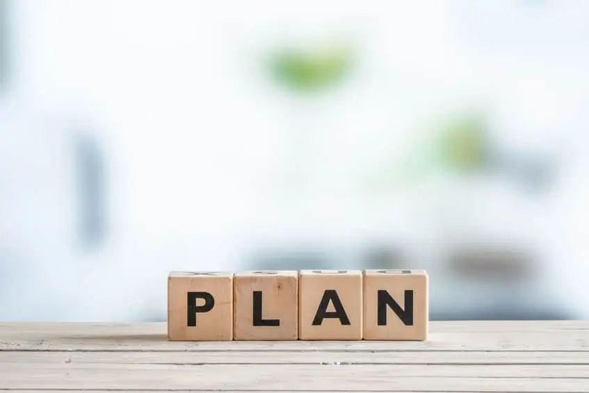 wooden blocks spelling out the word plan