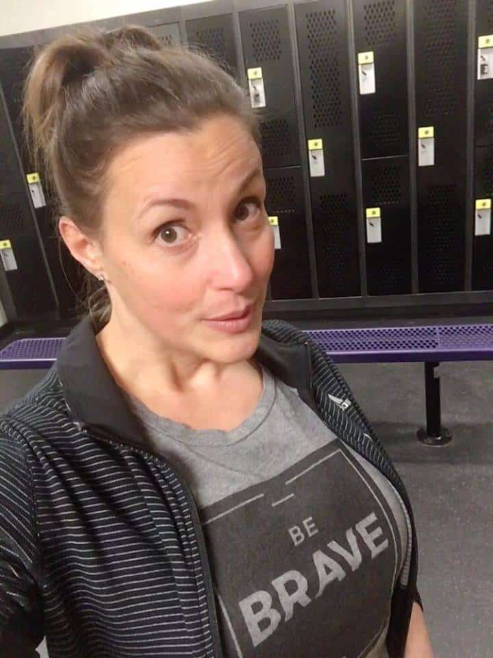 Kristie from Saving Dollars and Sense at Planet Fitness in a \"Be Brave\" shirt.