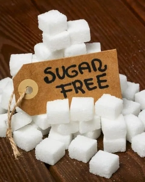 pile of sugar cubes with a sign that says sugar free