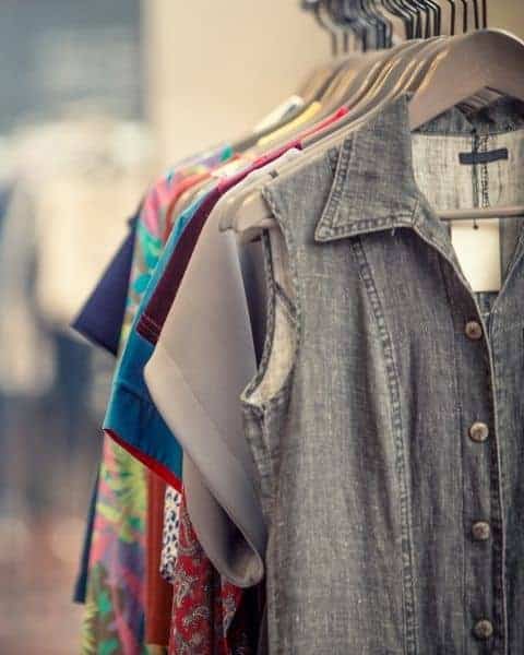 a clothing rack full of clothes