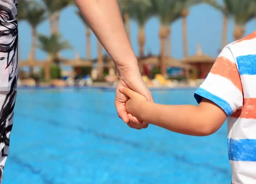 A close up of a girl in a pool of water. Summer Safety Tips You Don\'t Want To Miss