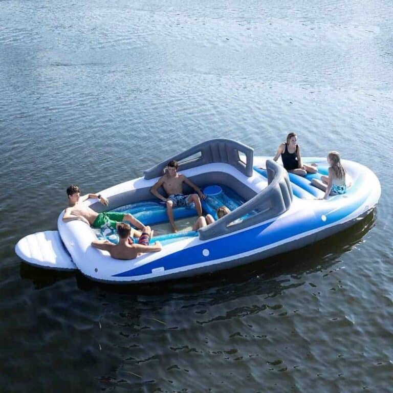 A boat on a body of water.  Life-size Inflatable Speed Boat