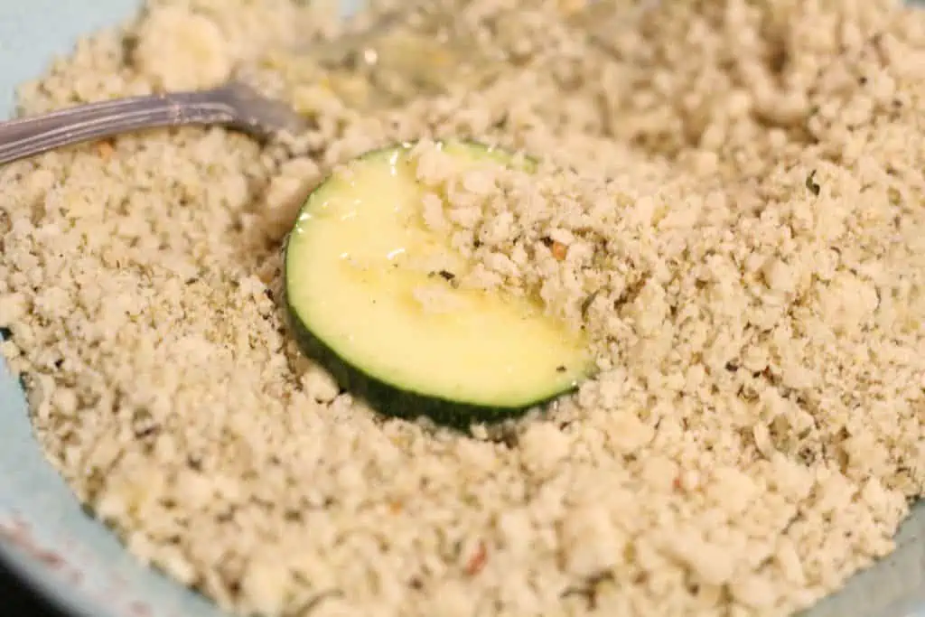 Dip zucchini in eggs and bread crumbs.