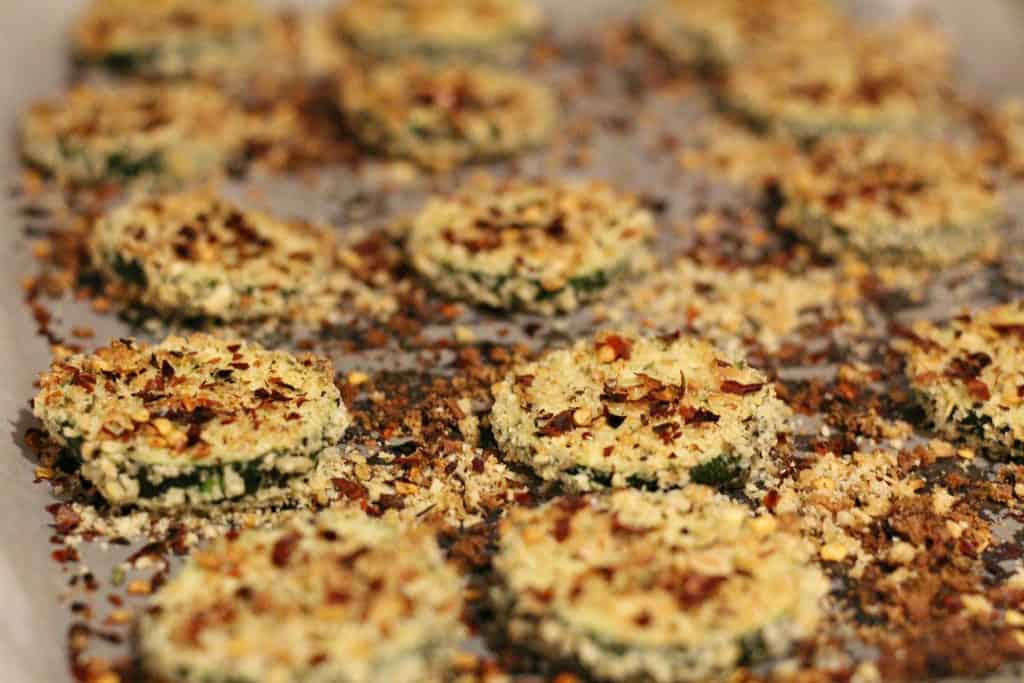 adding on chili flakes to zucchini chips 