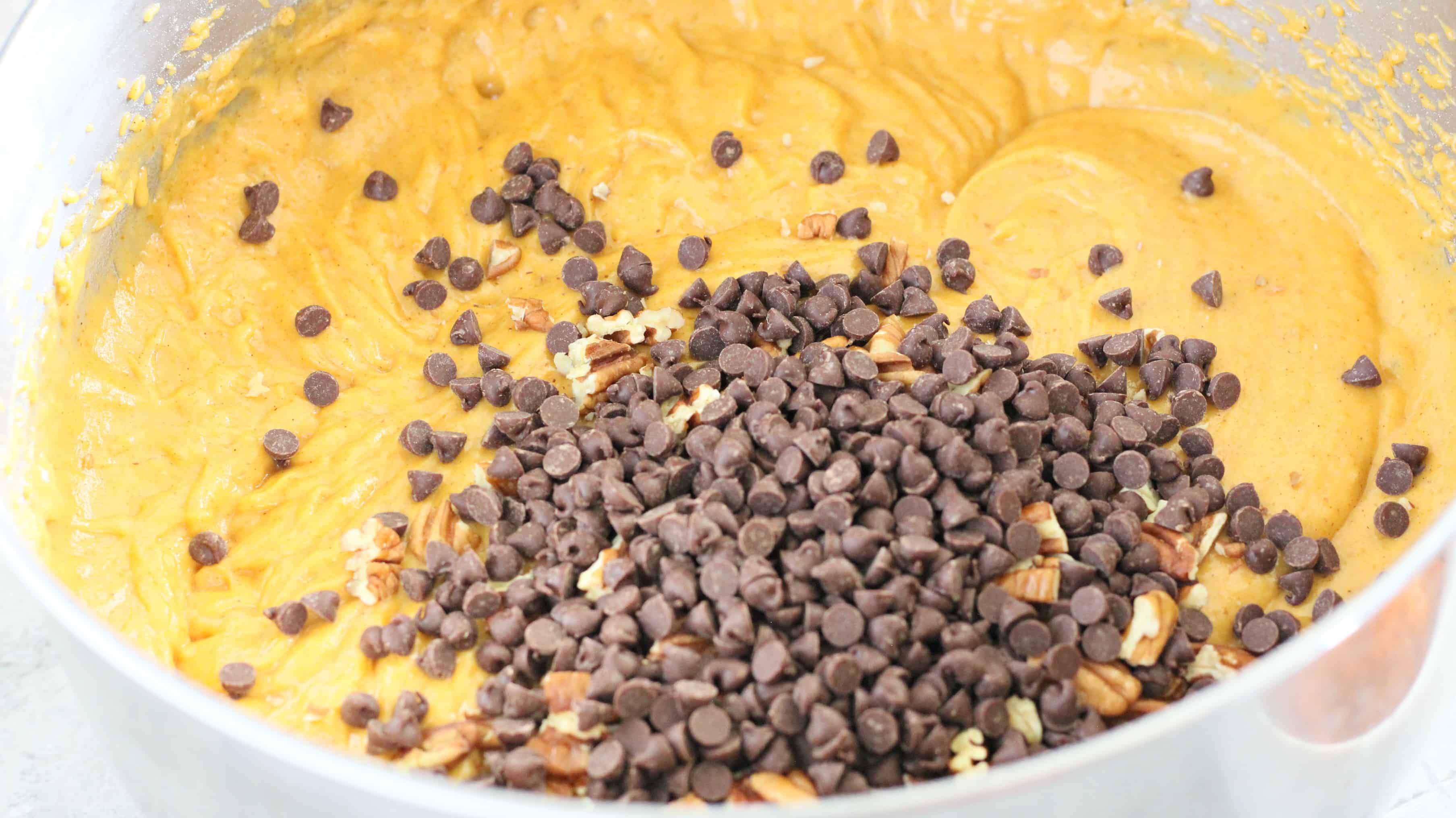 Add nuts and chocolate chips into the batter for Chocolate Chip Pumpkin Cake
