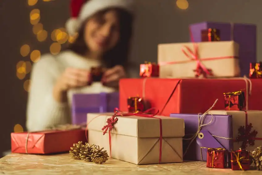 A stack of wrapped Christmas presents.