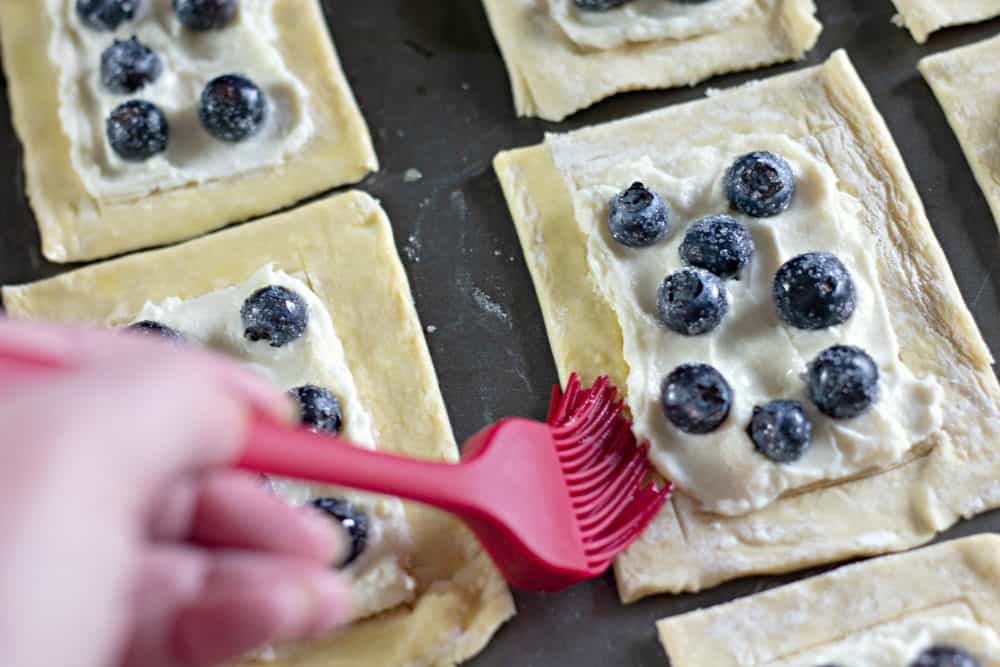 Cover the edge of the pastry with an egg and water wash.