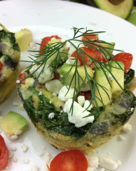 A plate of food, with Egg and veggies