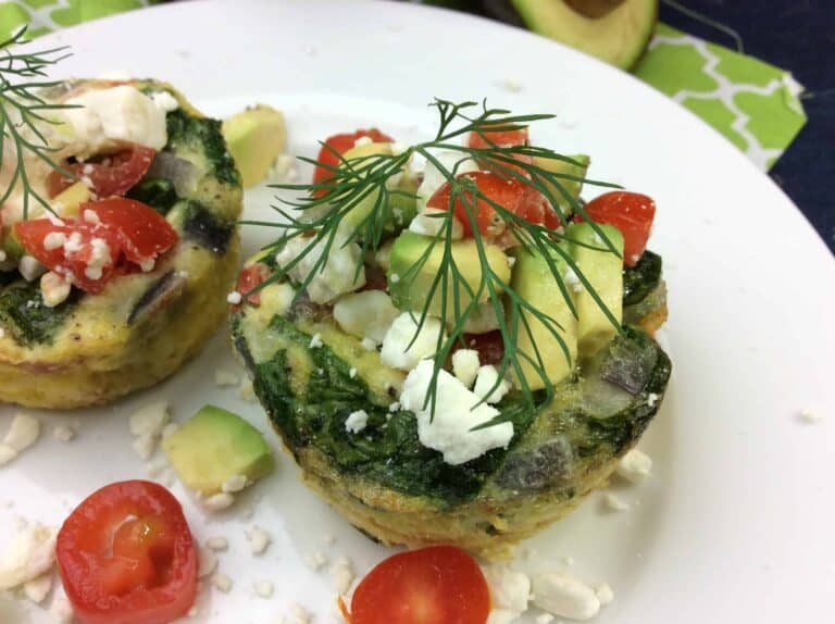 A plate of food, with Egg and veggies