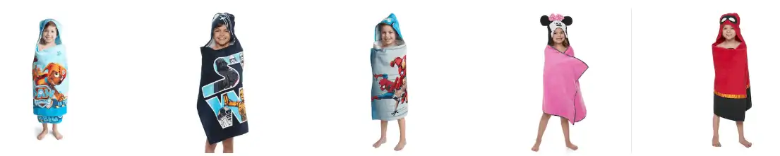 Little boy in a Marvel hooded bath towel on sale.