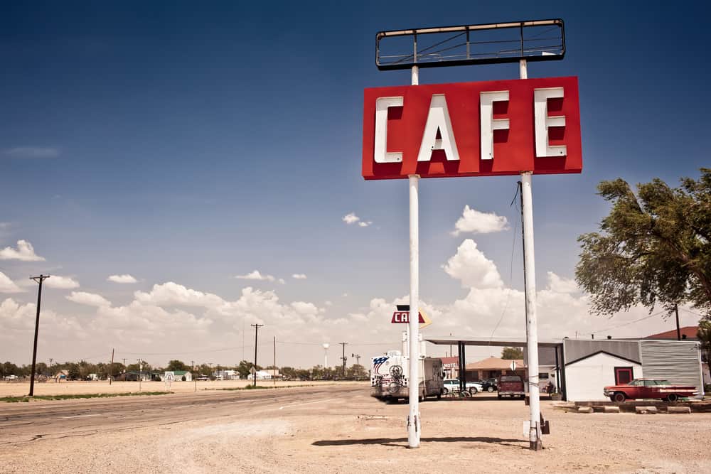 Cafe sign along historic Route 66 in Texas. Vintage Processing.