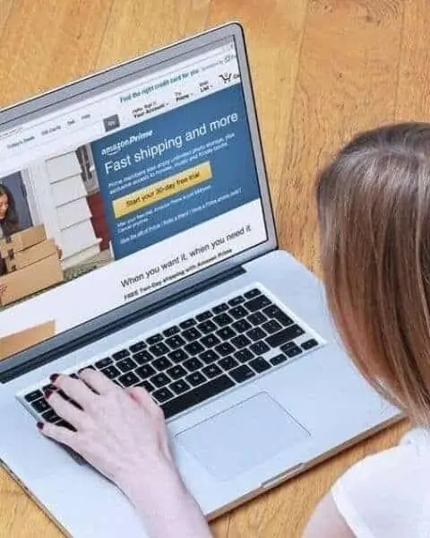 woman shopping on a laptop at Amazon