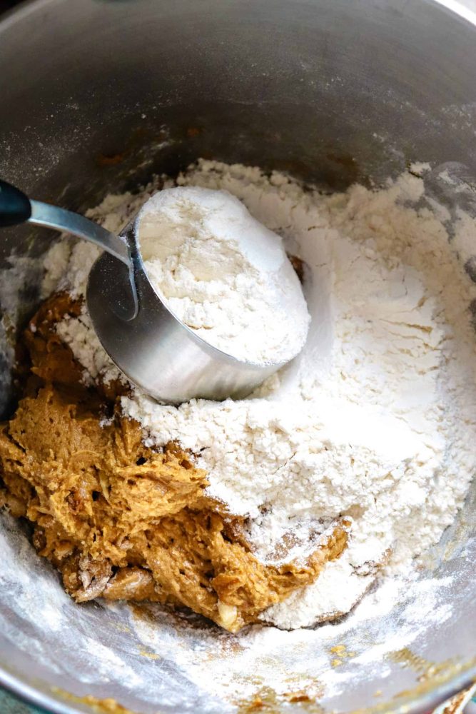 christmas gingersnaps mix dry ingredients with wet ingredients.