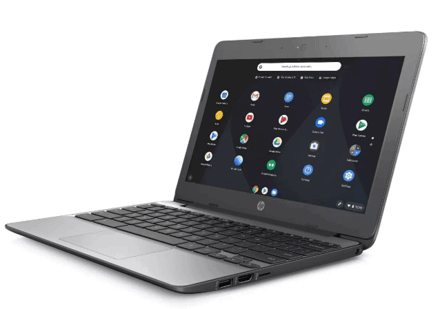 An open laptop computer sitting on top of a table