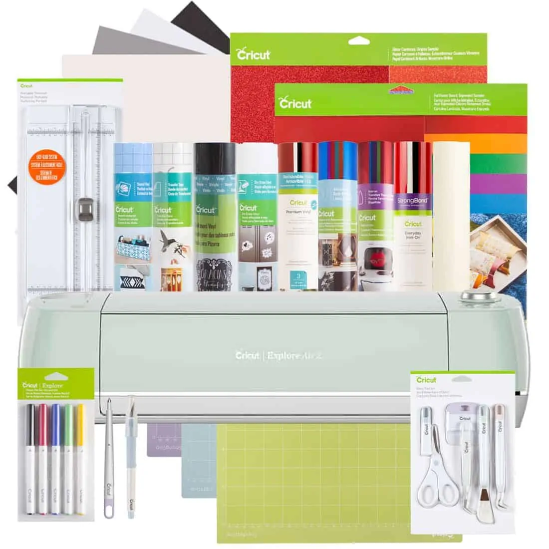 Cricut Explore Air surrounded by Cricut supplies.