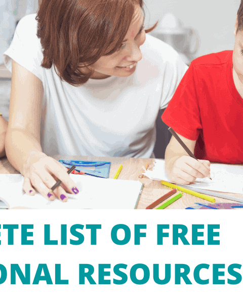 A young boy sitting at a table looking at a laptop with his parent as he uses one of the free educational resources for kids who are stuck at home.