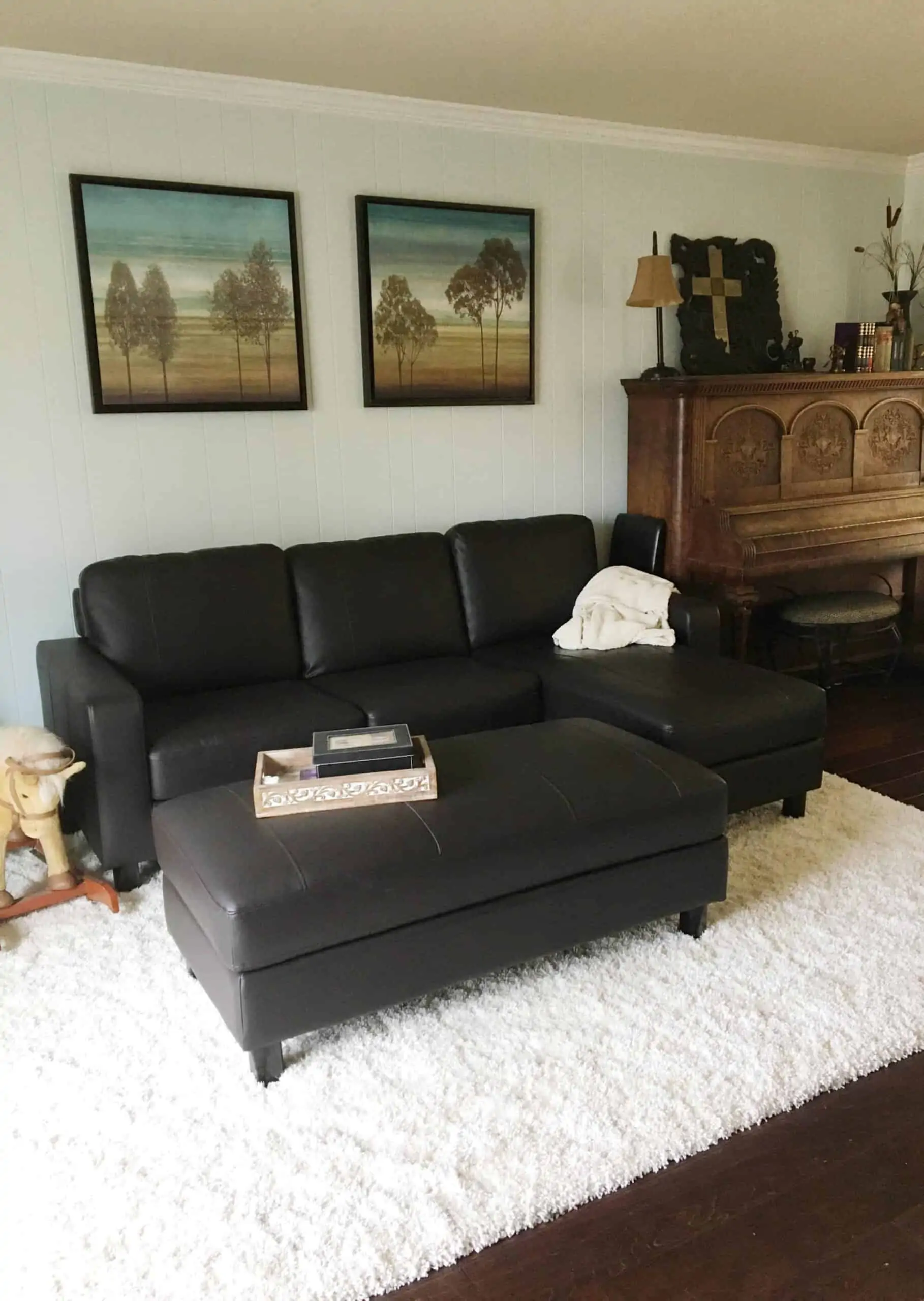 A living room filled with furniture and a flat screen tv