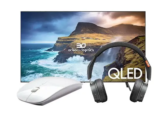 A variety of electronics and computer accessories in front of an image of a cliff side and water splashing. 
