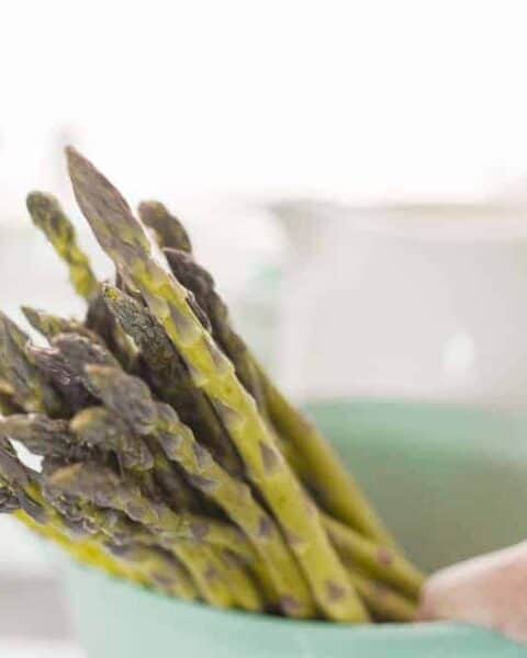 Fresh green asparagus for cooking dinner at home in the kitchen