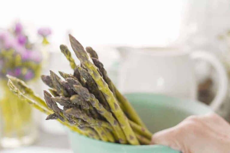 Fresh green asparagus for cooking dinner at home in the kitchen