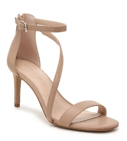 Sandal heel with pink hues and straps for secure placing.