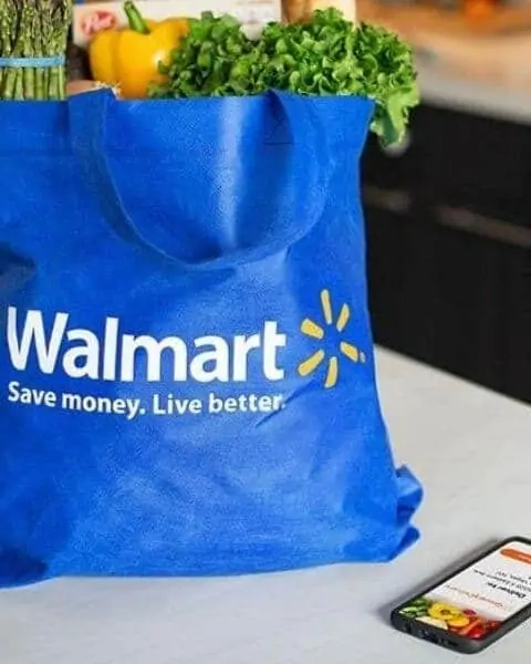 groceries inside a walmart reusable bag.
