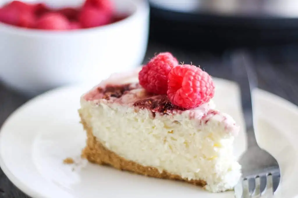 Close up of Instant Pot Raspberry Swirl Cheesecake Recipe