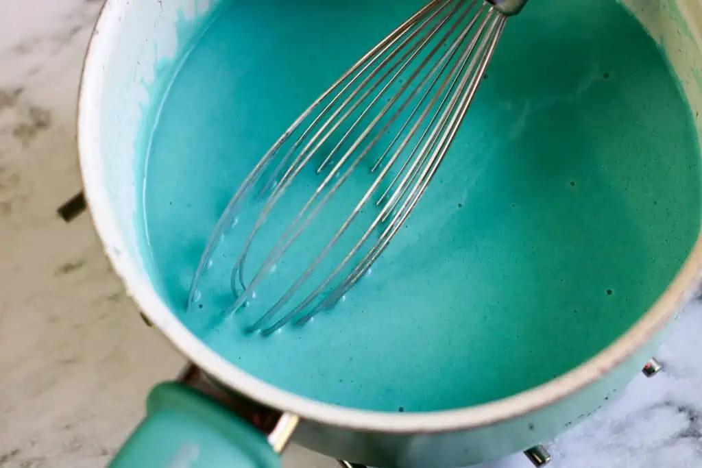 ingredients for Jello Playdough in a pot mixed altogether