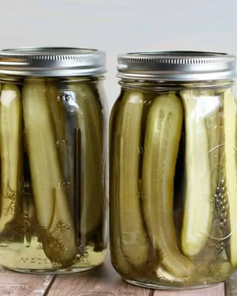 Canned drill pickles in mason jars.