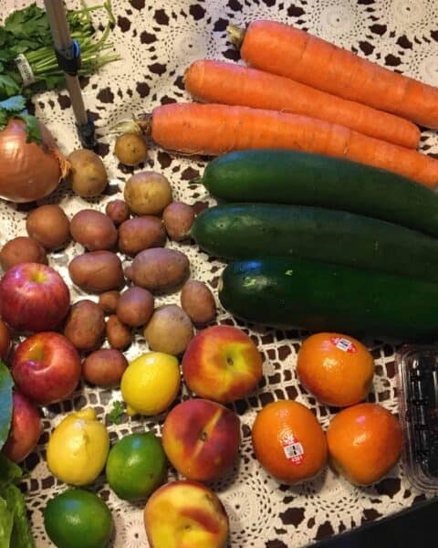 Countertop full of produce.