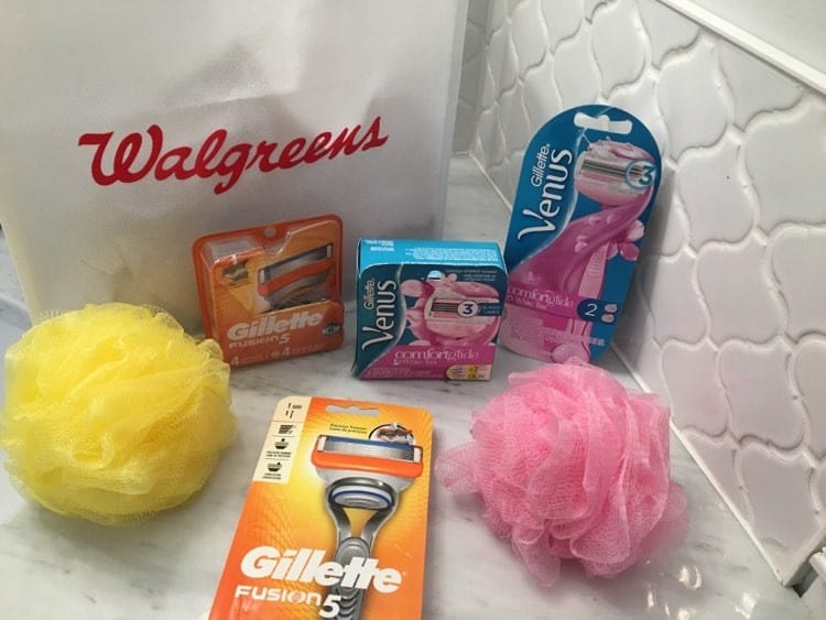 A Walgreens grocery bag with Venus and Gillette bathroom shaving supplies.