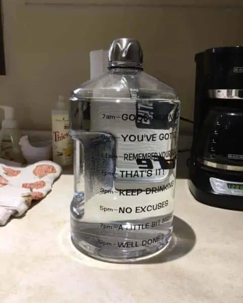 A gallon jug of water for creating healthy drinking habits.