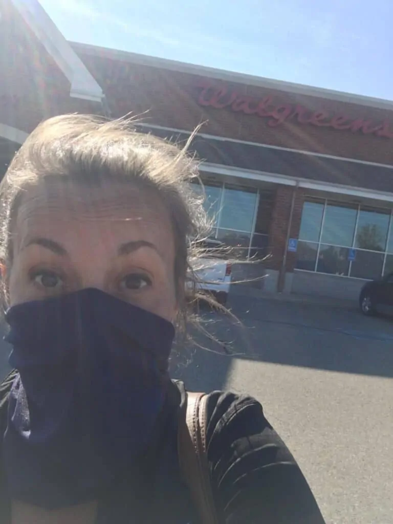 Woman standing outside Walgreens after buying Pantene 3-Step Hair Care System