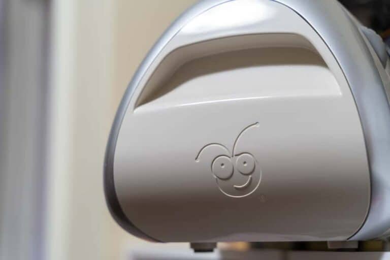 Close up of the Cricut logo on a Cricut Expression die cutting machine, used for paper and vinyl crafts