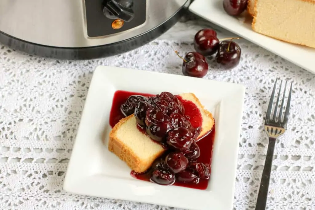 Cherry jubilee being made using a slow cooker.