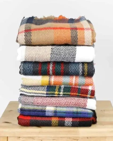 A stack of blanket scarves.