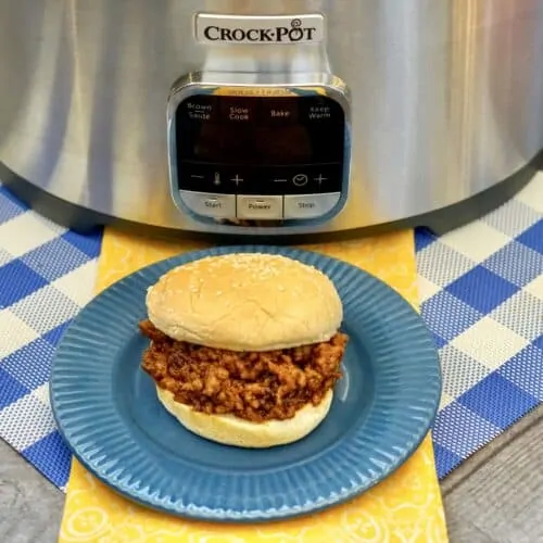 Final homemade sloppy joe on a blue plate.