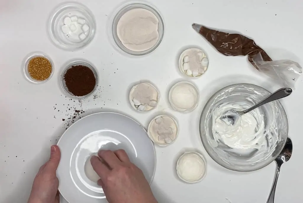 Press together to make white chocolate cocoa balls.
