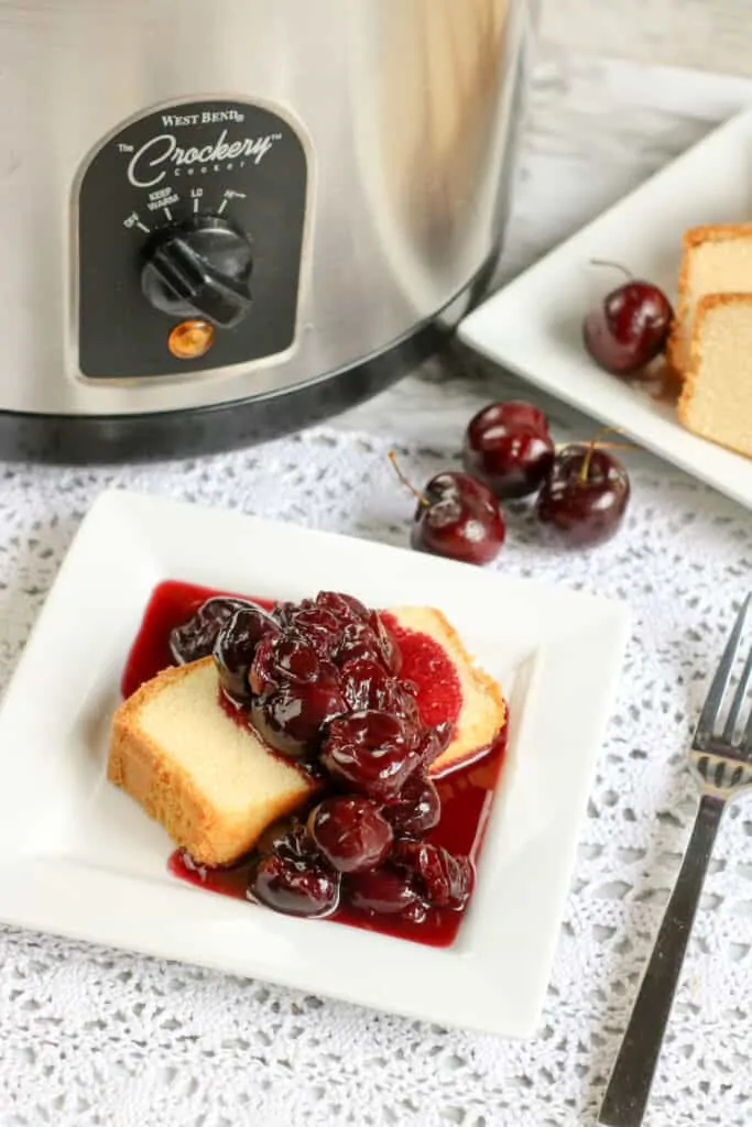 A plate of cherry jubilee using a slow cooker.